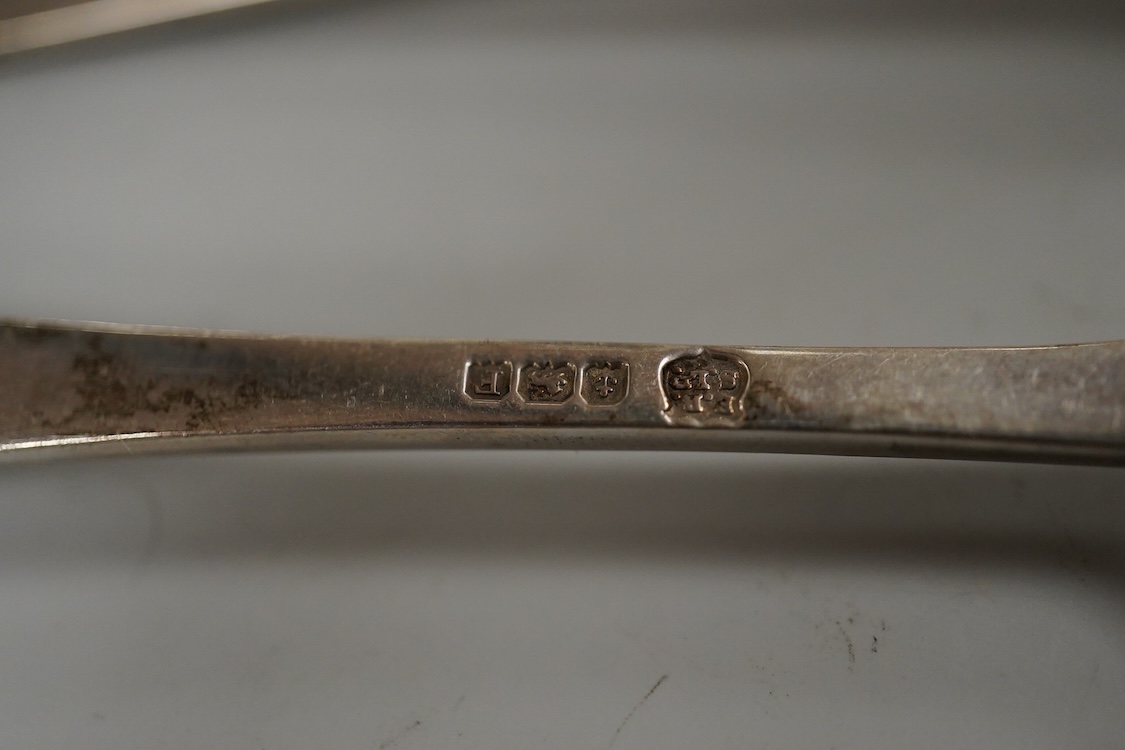 Two George V silver loving cups, one by Atkin Brothers, Sheffield, 1926, height 89mm and a set of four silver Hanoverian pattern dessert forks, Birmingham, 1930, 16.4oz.